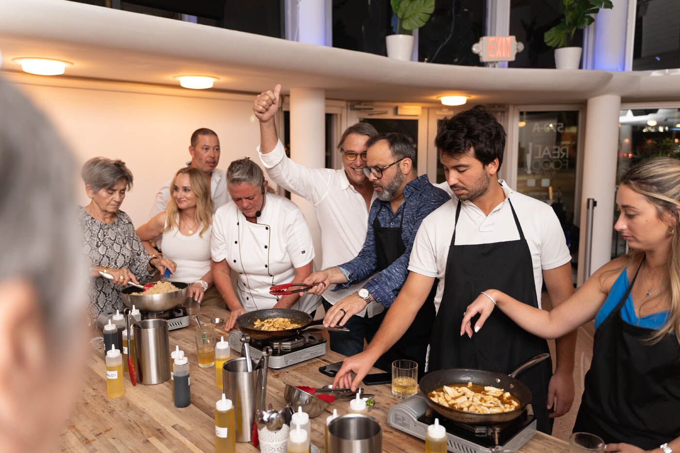 A chef leading one of The Real Food Academy's corporate team building cooking classes.