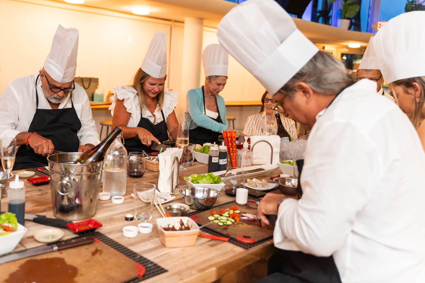 A corporate team at The Real Food Academy participating in the ultimate corporate experience.