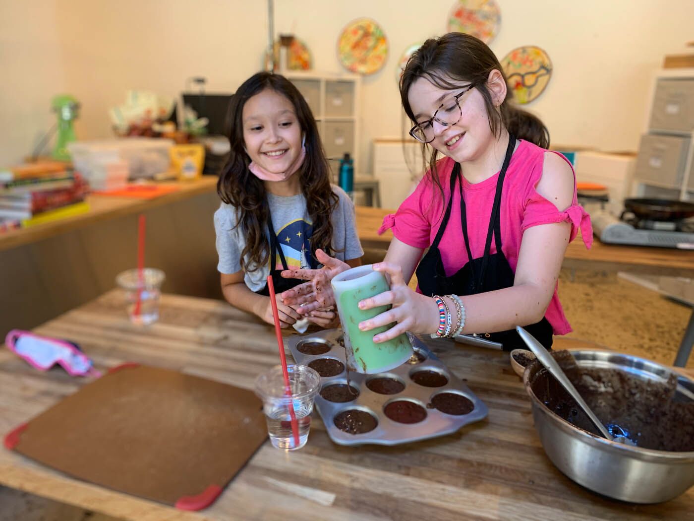 Two little girls making healthy brownies at The Real Food Academy's after school program.