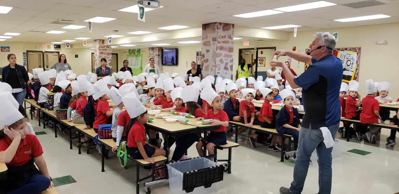 Owner Arthur Cummins leading a cooking field trip.