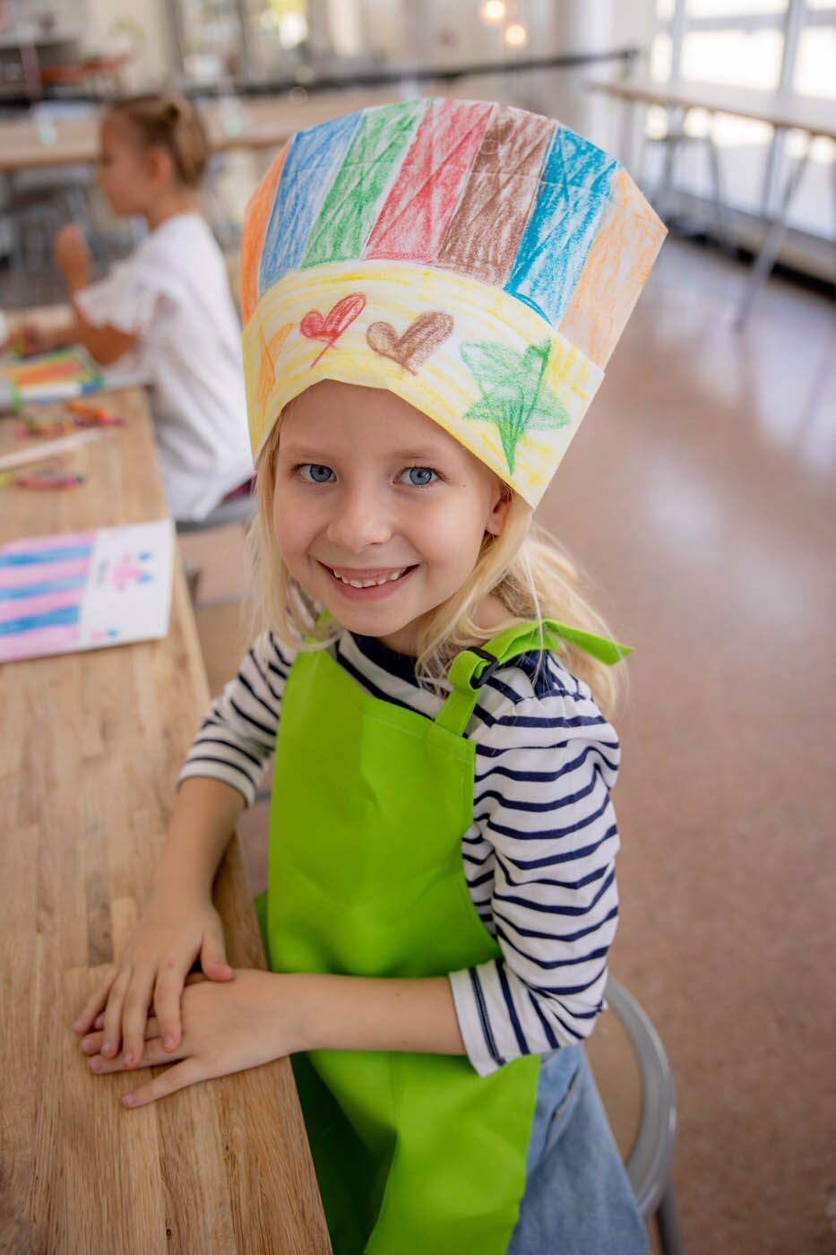 A little girl dancing at The Real Food Academy's cooking class birthday party.