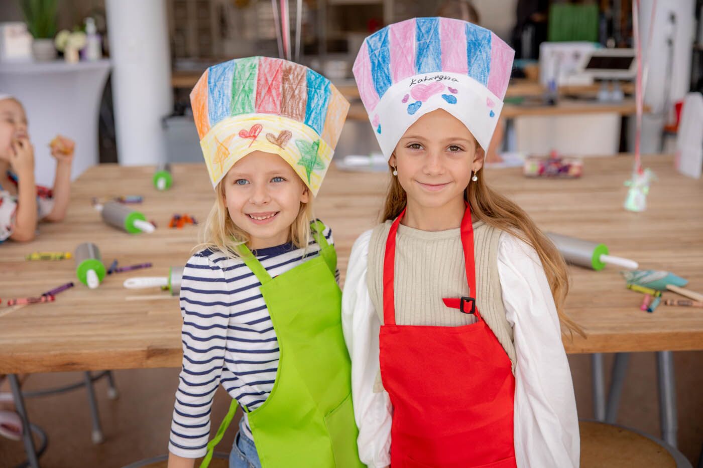 A parent and child enjoying their party at The Real Food Academy.