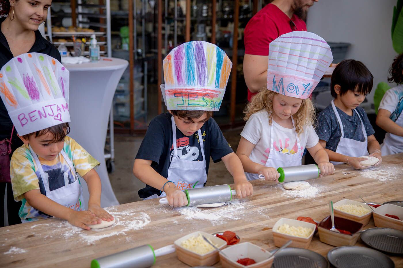 Kids cooking together at a Real Food Academy kids party.
