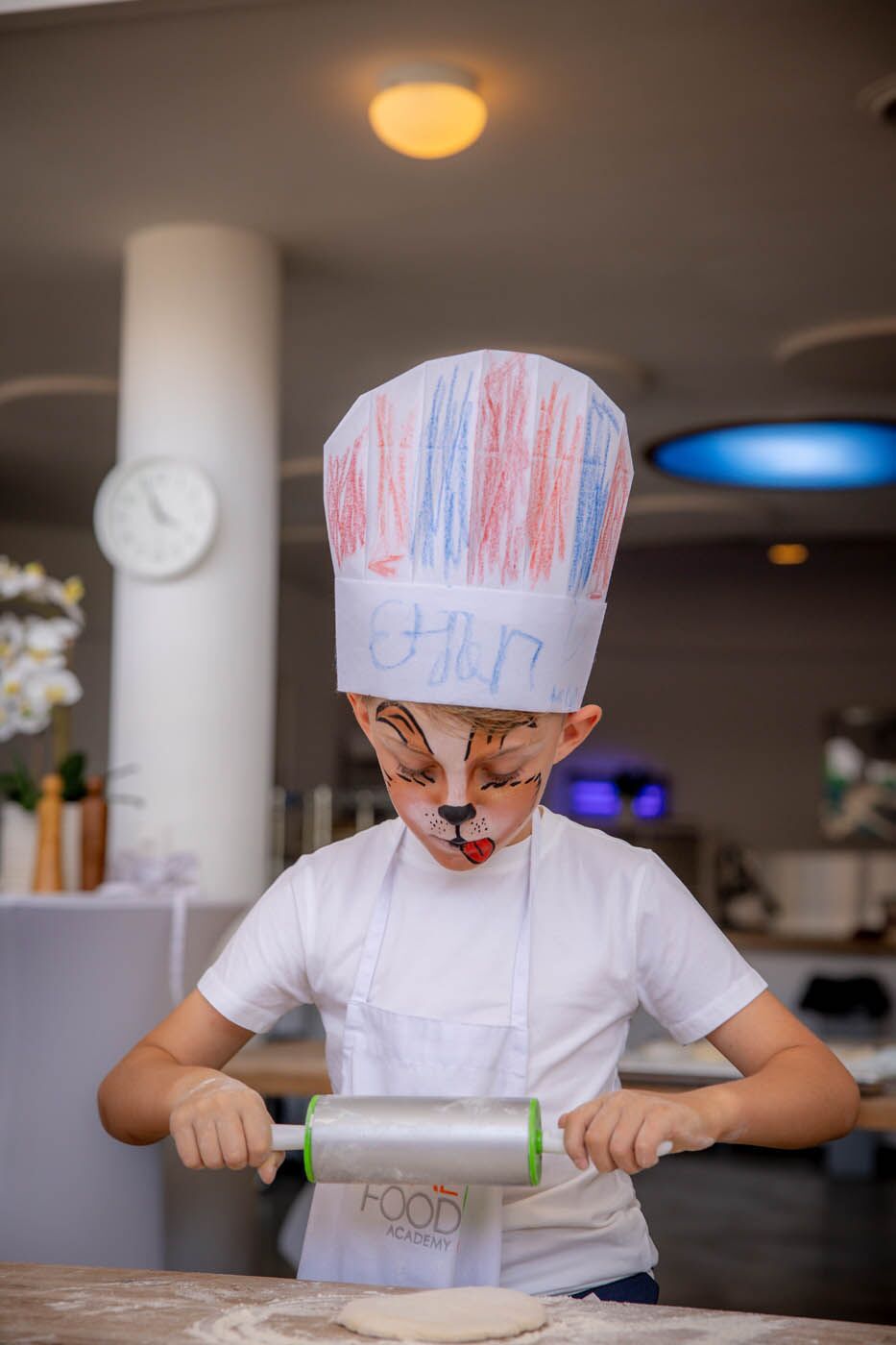 A parent and child enjoying their party at The Real Food Academy.