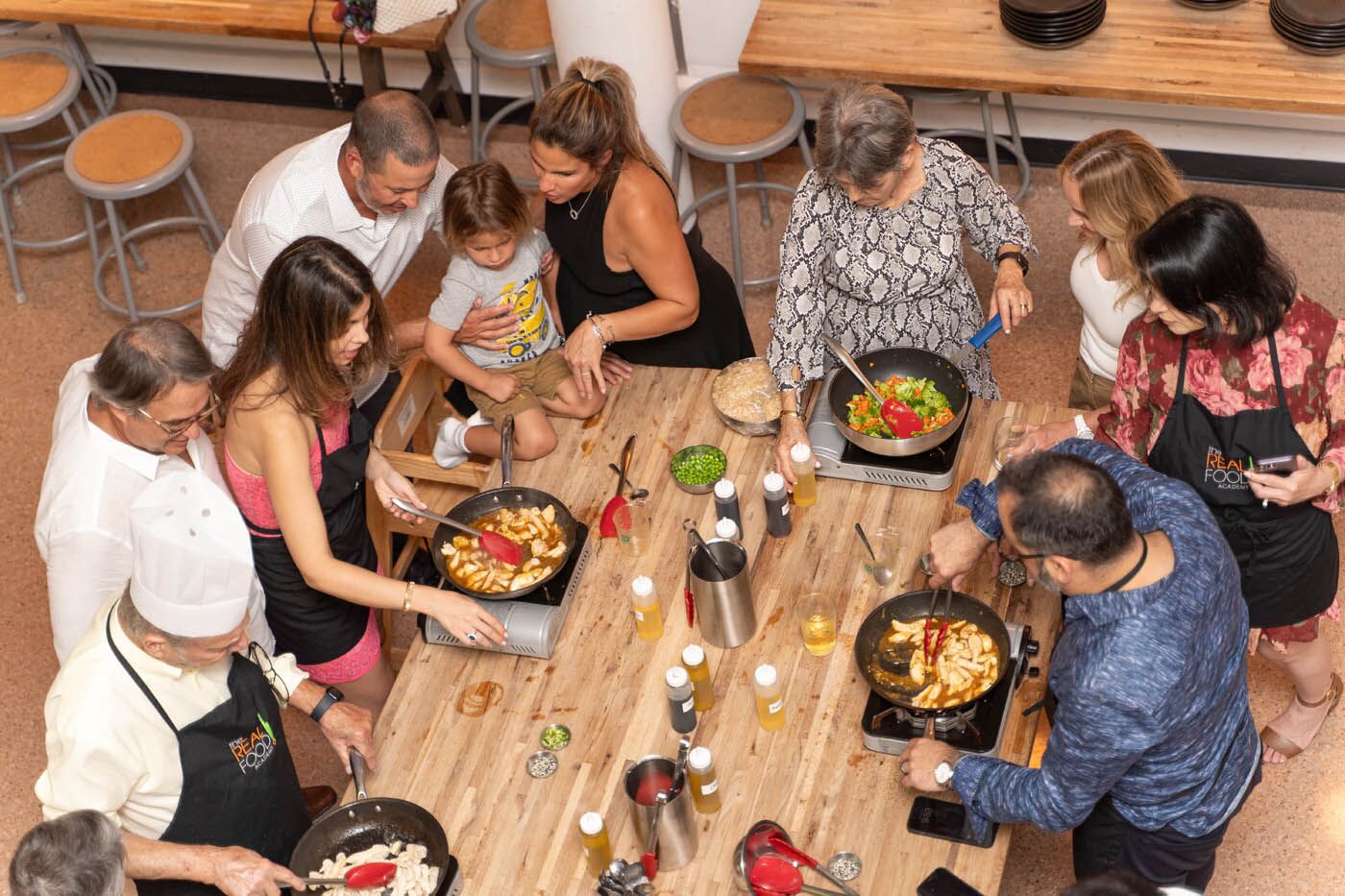 Sky view of an adult party at The Real Food Academy.
