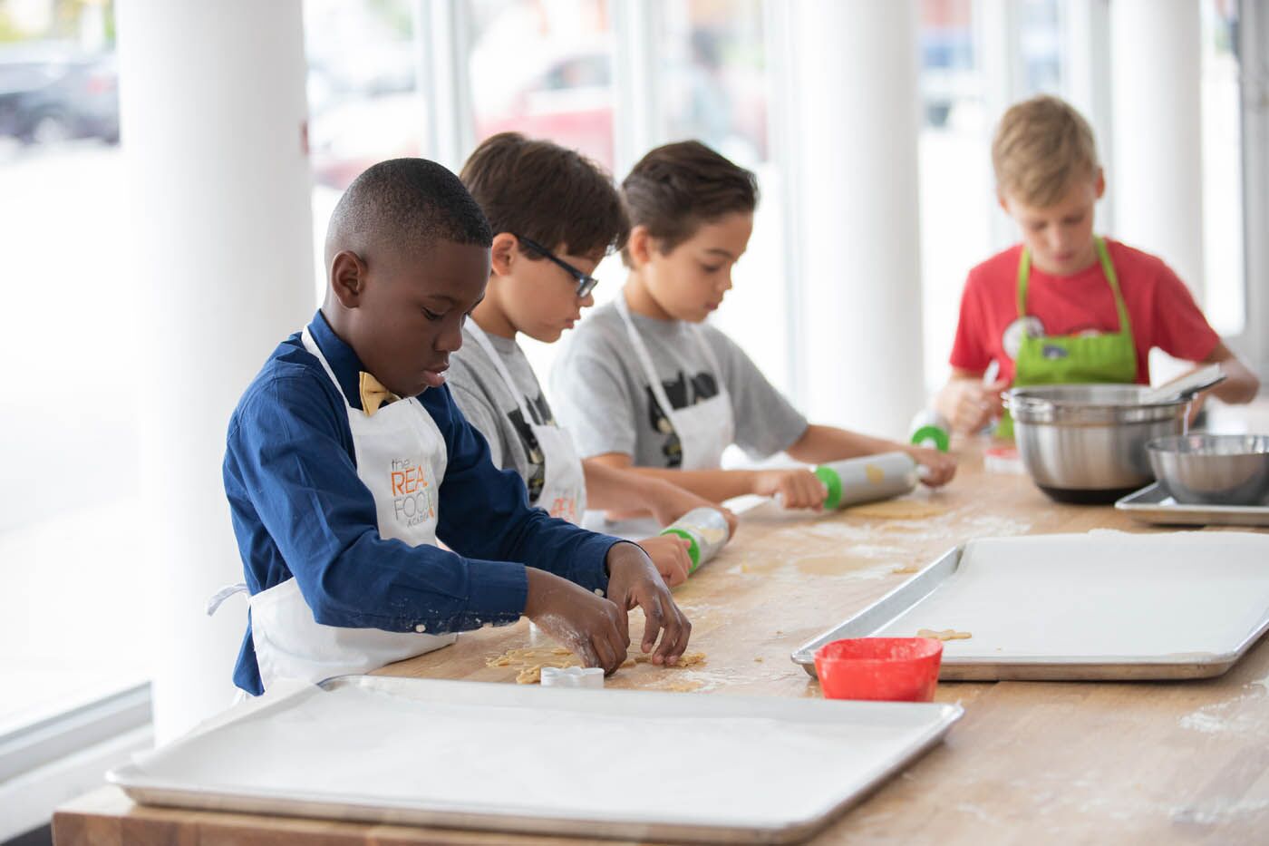 Kids enjoying their time at The Real Food Academy with our hands-on holiday cooking classes today.