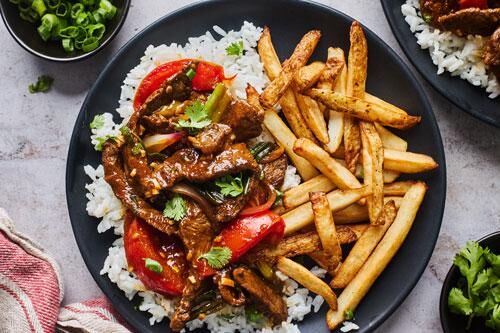 The Real Food Academy Miami's lomo saltado recipe.
