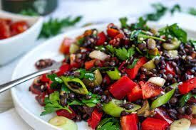 The Real Food Academy Miami's mediterranean lentil salad with forbidden black rice recipe.