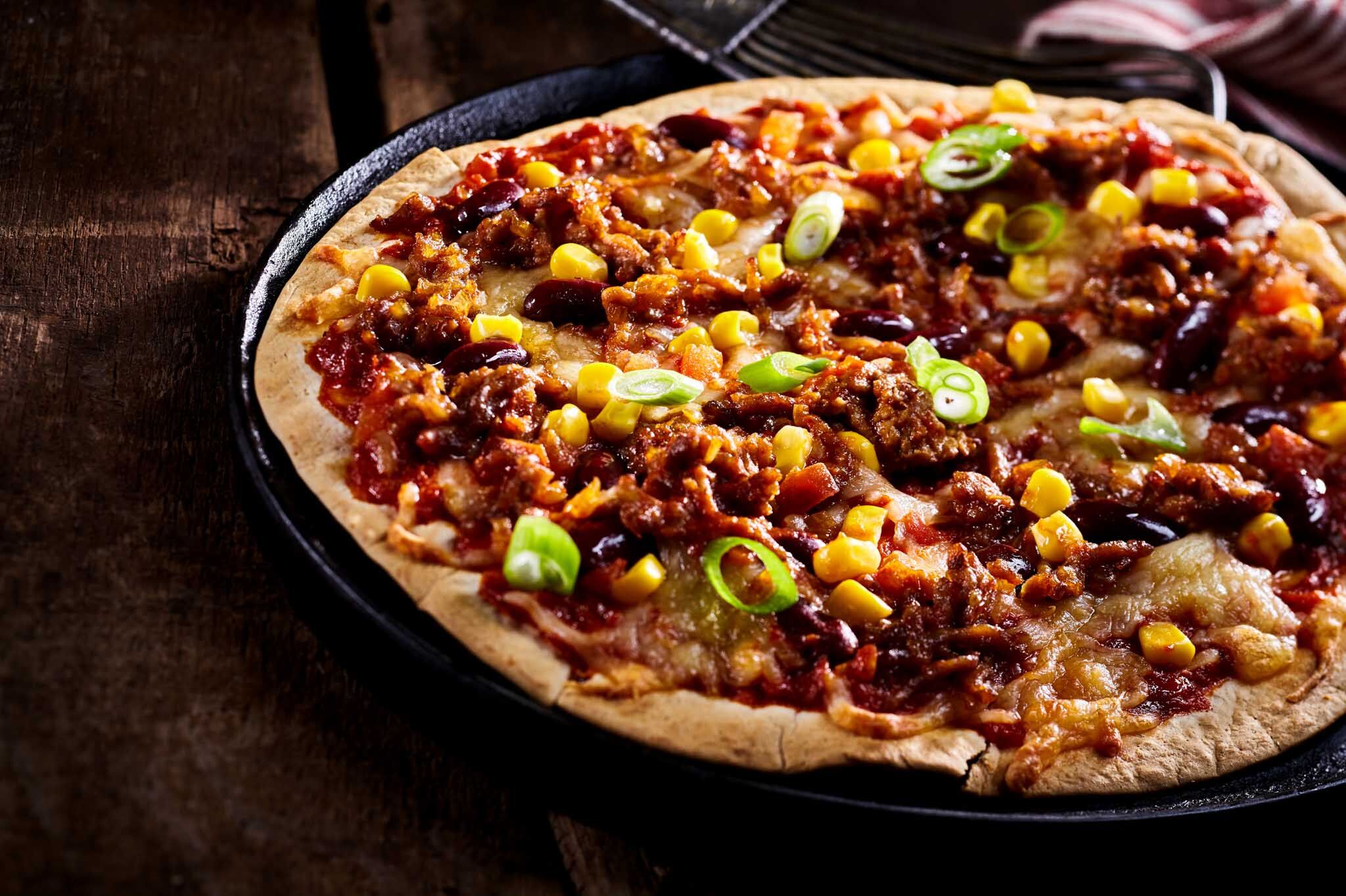 The Real Food Academy Miami fresh made mexican pizza with beans spread.