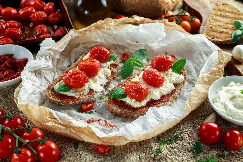 The Real Food Academy Miami's whipped ricotta and butternut with roasted tomatoes bruschetta recipe.