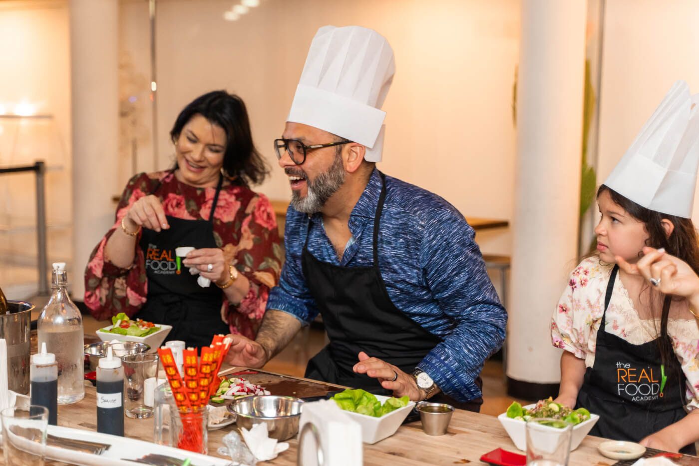 Two adults at healthy cooking classes with The Real Food Academy. 
